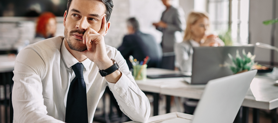 Pensive Businessman Sitting Desk Office Thinking New Ideas There Are People Background